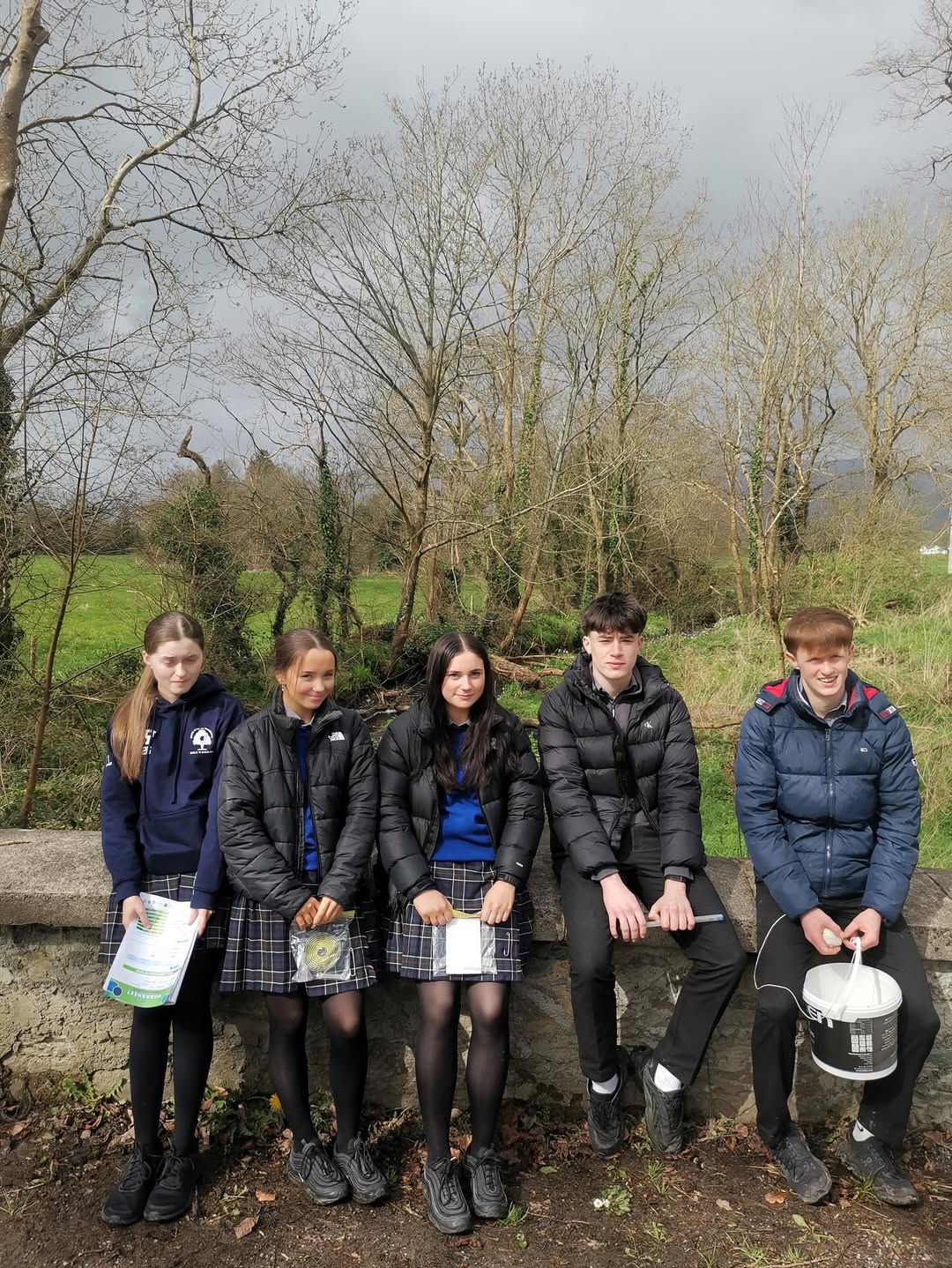 TY students by the river during ecosystem survey photo 3