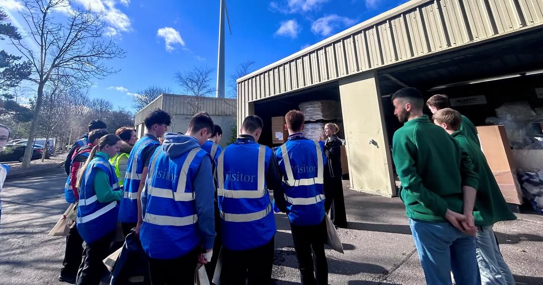 Students listening to presentation at Astellas