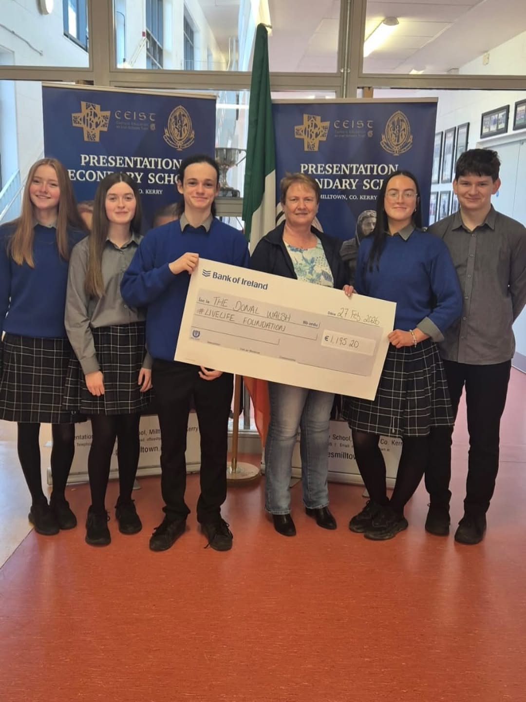TYs present donation to Elma Walsh